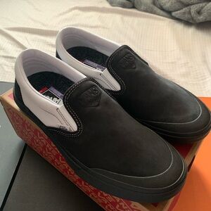 Vans Men's Black and White Slip-On Shoes